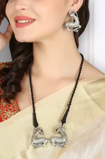 Oxidised silver-plated stone studded pendant with drawstring