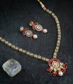 Women gold plated stone studded pearl tessel necklace and earrings