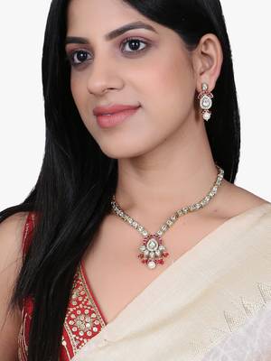 Women gold plated stone studded pearl tessel necklace and earrings 5