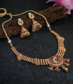 Women gold plated stone studded pearl beaded peacock necklace and jhumkis