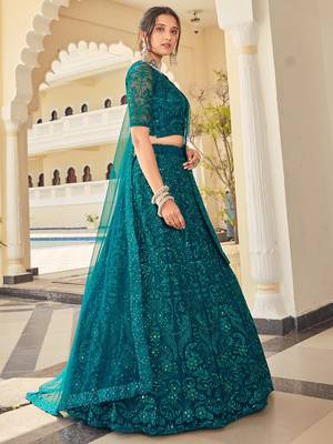 teal green thread embroidery net lehenga set choli with dupatta 2