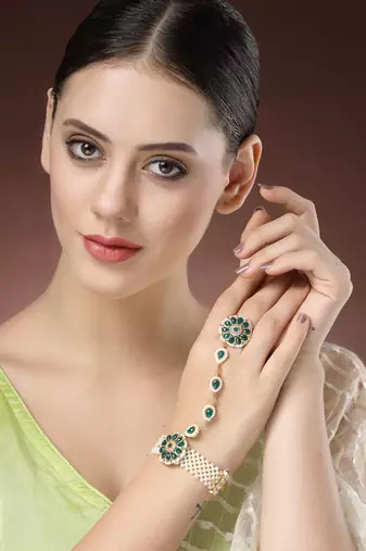 women green gold-plated stone studded handcrafted ring bracelet