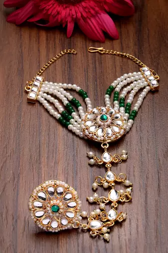 women green gold-plated stone studded handcrafted ring bracelet