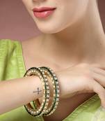 gold alloy bangles with kundan studded work