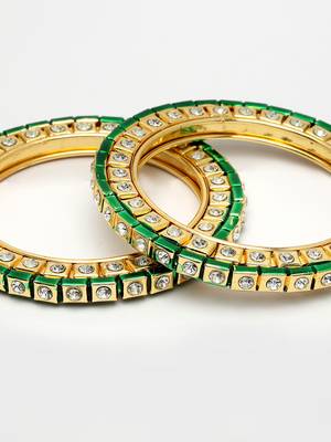 gold alloy bangles with kundan studded work 3
