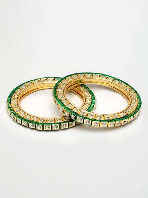 gold alloy bangles with kundan studded work 4