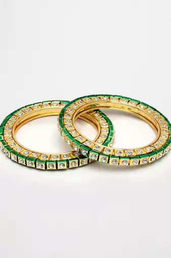 gold alloy bangles with kundan studded work