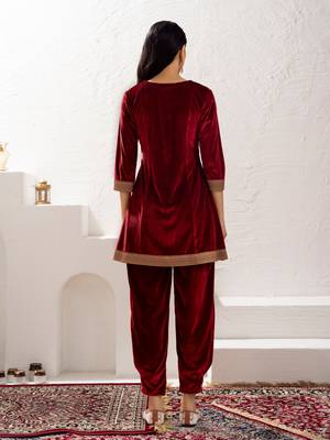 Aask women solid velvet lace work maroon color kurta & pant set 2