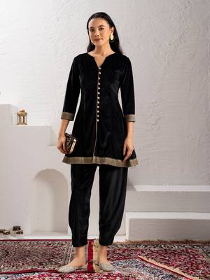 Aask women solid velvet lace work black color kurta & pant set 1