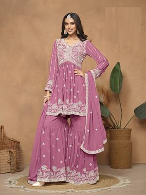 Pink embroidered faux georgette sharara suit 1