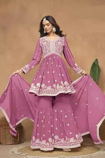 Pink embroidered faux georgette sharara suit