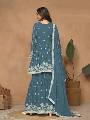 Teal embroidered faux georgette sharara suit 3