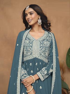 Teal embroidered faux georgette sharara suit 4