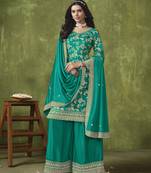 Cyan embroidered dola silk jacquard semi stitched palazzo suit