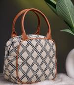 geomat beige, black & tan lattice cotton jacquard handheld bag