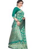 Turquoise woven silk blend saree with blouse