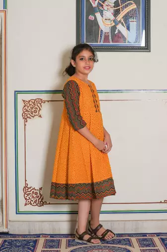  kids cotton geometric print anarkali dress (mustard)