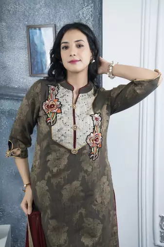 Nikhaar black embroidered georgette asymmetrical kurta & pants set