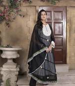 Nikhaar black embroidered georgette asymmetrical kurta & pants set