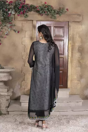 Nikhaar black embroidered georgette asymmetrical kurta & pants set