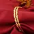 Elegant Gold-Plated Twisted Bangles