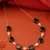 Green Stone Necklace with Rose-Shaped Beads