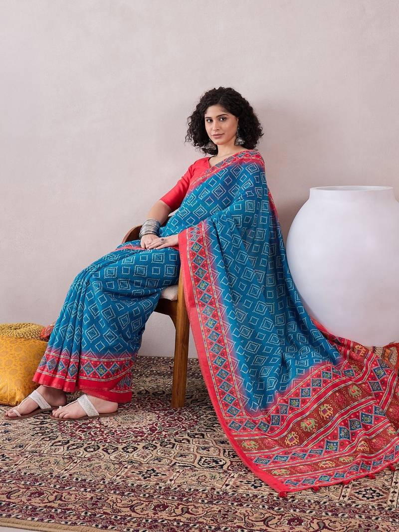 women blue linen bandhani printed saree