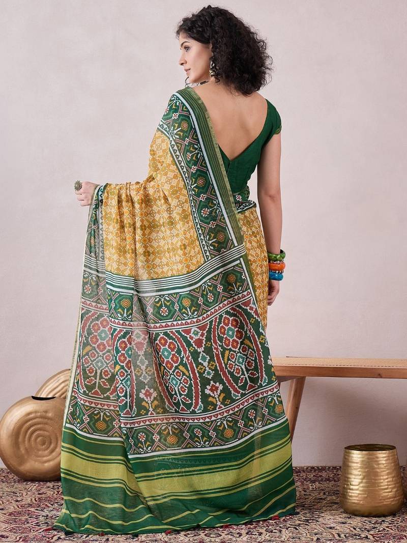 women cream linen patola printed saree
