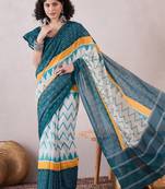 women teal linen ikat printed saree