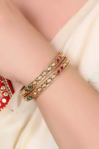 Set of 4 gold plated stone studded traditional bangles