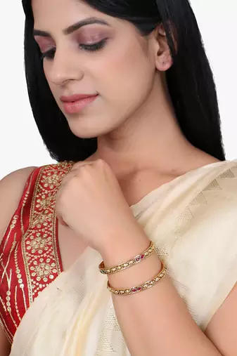 Set of 4 gold plated stone studded traditional bangles