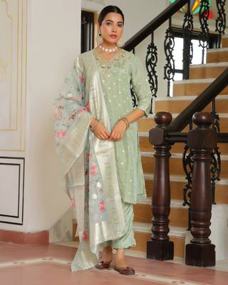 Vaasva women aqua tissue brocade embroidered kurta with scalloped pant & dupatta 1