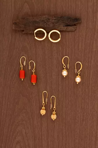 Four sets of earrings - one gram gold