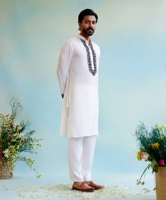 White embroidered kurta with narrow pants 2