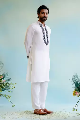White embroidered kurta with narrow pants