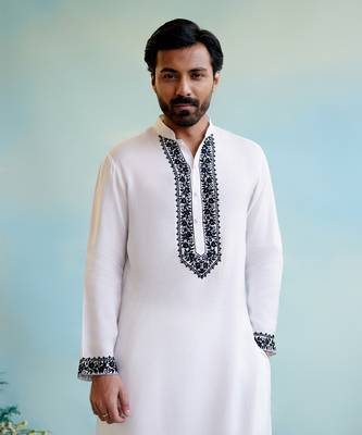 White embroidered kurta with narrow pants 3