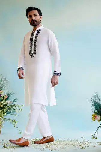 White embroidered kurta with narrow pants