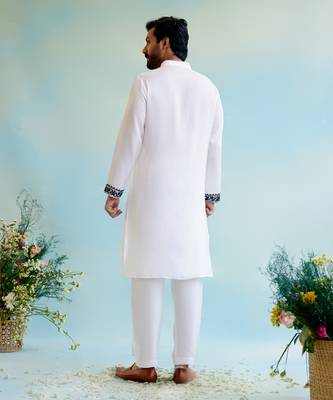 White embroidered kurta with narrow pants 5