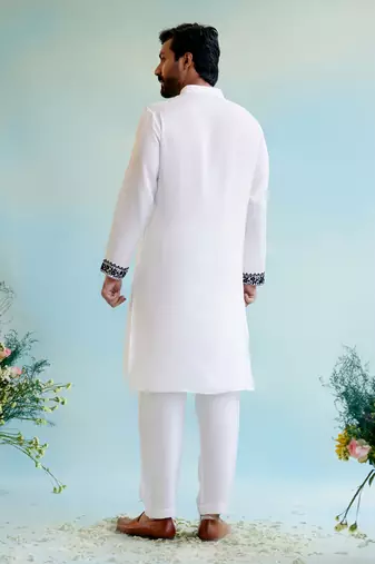 White embroidered kurta with narrow pants