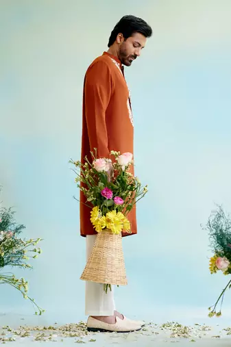 Orange flora dori kurta with narrow pants