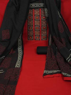 Maroon unstitched suit set with a mix-and-match yoke and handwork details with printed dupatta and plain bottom. 1