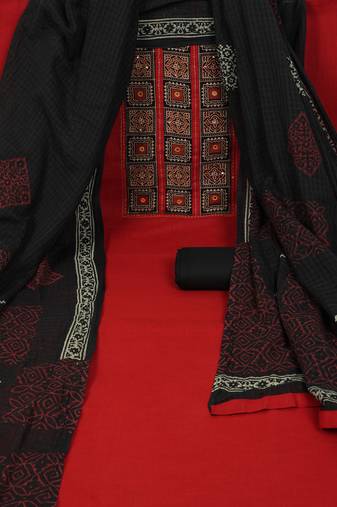 Maroon unstitched suit set with a mix-and-match yoke and handwork details with printed dupatta and plain bottom.