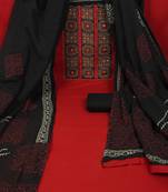Maroon unstitched suit set with a mix-and-match yoke and handwork details with printed dupatta and plain bottom.