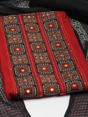 Maroon unstitched suit set with a mix-and-match yoke and handwork details with printed dupatta and plain bottom. 2