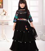 Tiny kingdom black colored mirror work embroidered sea shell pom pom georgette fabric lehenga choli set