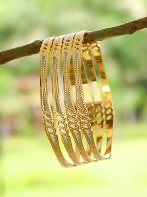 Women gold-plated traditional self design set of four bangles 1