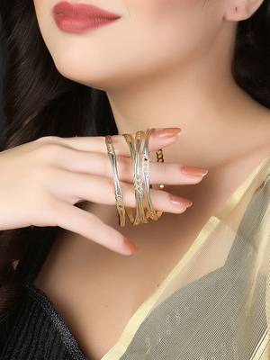 Women gold-plated traditional self design set of four bangles 2