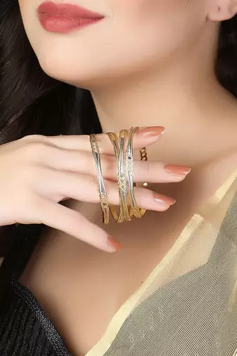 Women gold-plated traditional self design set of four bangles