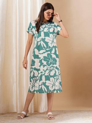 Blue printed cotton dress with hand embroidery and pocket. 1