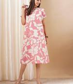 Pink printed cotton dress with hand embroidery and pocket.